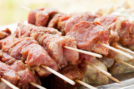 slices of meat ready for the grillの写真素材