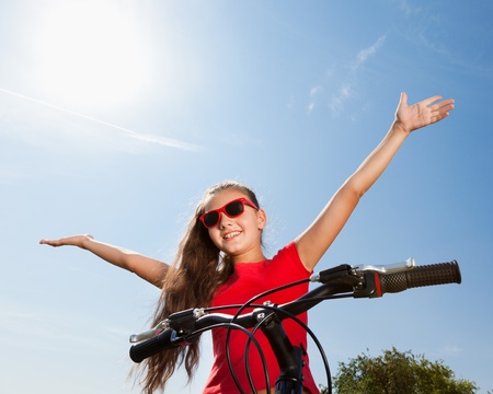 teenage girl on a bicycle の写真素材