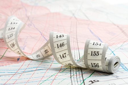 Dressmaker or tailor professional equipment  measuring tape and  patterns of clothingの写真素材