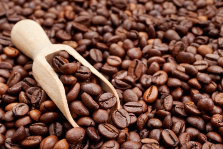 coffee beans and wooden scoopの写真素材
