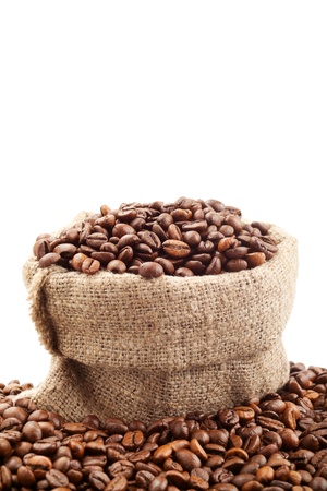 canvas sack with coffee beans on whiteの写真素材