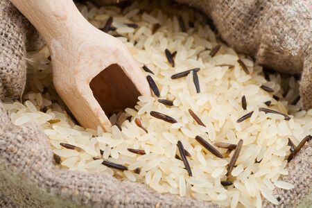 rice in burlap sackの写真素材