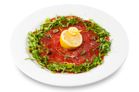 Beef Carpaccio with lemon and spring onionの写真素材