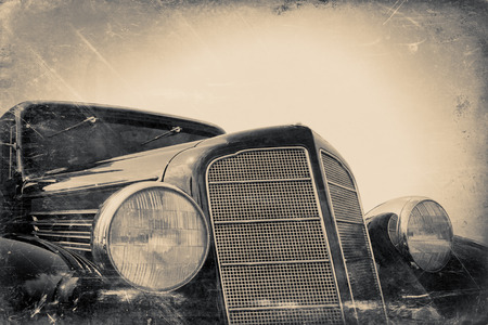 fragment of old car, vintage stylized shabby photoの写真素材