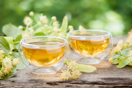 Two cups of healthy linden tea, herbal medicine.の写真素材