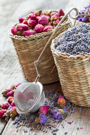 Lavender and roses Herbal tea in basket. Selective focus.の写真素材
