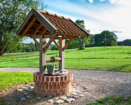 Retro wooden well waterの写真素材