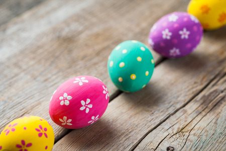 Colorful eggs on kitchen table.の写真素材