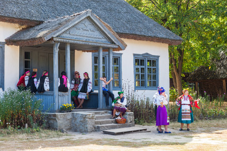 KIEV, UKRAINE - SEPTEMBER 18, 2016: Ukrainian girls and women in Museum of Ukrainian Folk Architecture and Rural Life Pirogovo, on September 18, 2016. Kiev, Ukraine.のeditorial素材