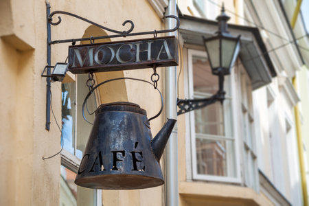 Tallinn, Estonia - June 2, 2016: Signboard of vintage cafe in the Historical Center of city. Tallinn, Estonia.のeditorial素材