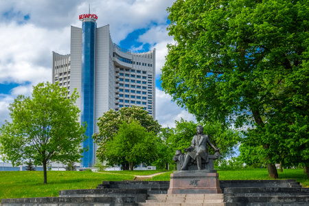 Minsk, Belarus - May 24, 2017: Hotel Belarus and sculpture of Alexander Pushkin, famous poet. Minsk, Belarus.のeditorial素材