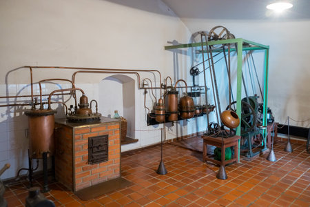 Kaunas, Lithuania - May 12, 2017: antique pharmaceutical tablet machine, retro industry device for medical pills production inside of Museum of the History of Medicine and Pharmacy. Kaunas, Lithuania.のeditorial素材
