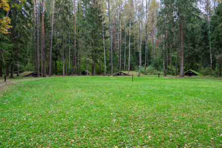 Stankovo villageââ, Belarus - October 08, 2017: A group of dugouts on the territory of military historical complex Partizanen camp in Stankovo villageââ, Minsk Region, Belarus.のeditorial素材