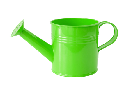 Green watering can, isolated on white background.の写真素材