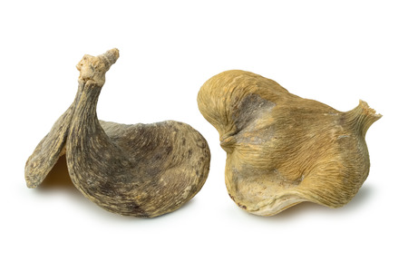 Dry exotic almond nutshell on whiteの写真素材