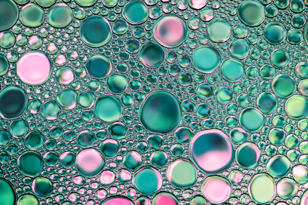 Beautiful background of green and pink water drops. Natural backdrop.の写真素材