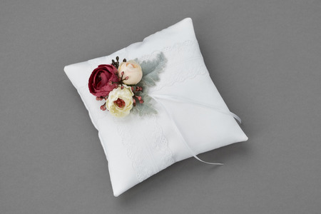 Wedding Pillow for Rings decorated with flowers.の写真素材