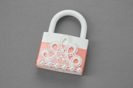 Ornate wedding Padlock decorated with lace and pearls.の写真素材