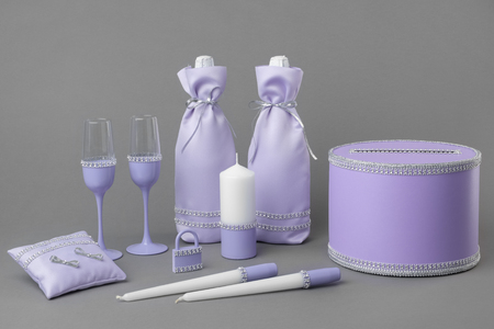 Wedding set: bottles of champagne, glasses, candles, box for money and wishes, wedding lock and pillow for rings.の写真素材