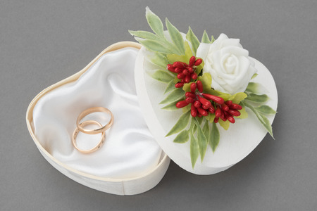 Wedding ornate box for Rings decorated with roses and berries.