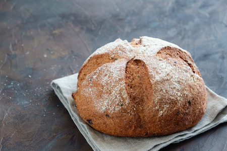 Fresh bread on a linen napkin.の写真素材