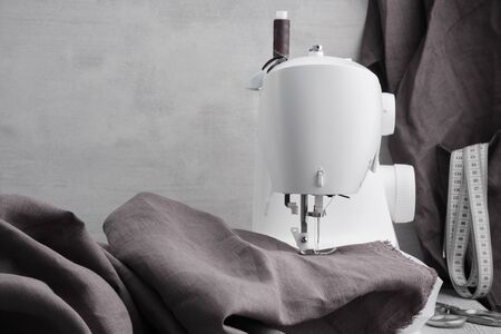Sewing linen clothes on a sewing machine.の写真素材