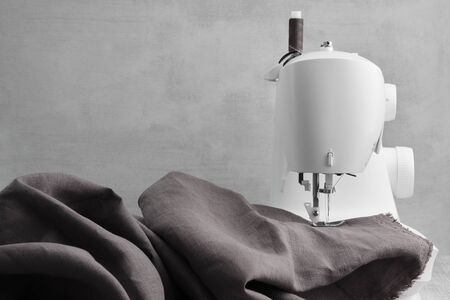 Sewing linen clothes on a sewing machine.の写真素材