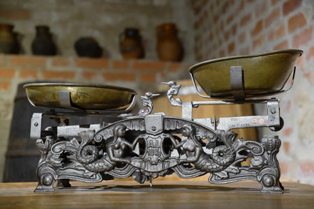 Mir, Belarus -  23-October-2019:  vintage scales in cellar at exposition in Mir castle. Mir, Grodno region, Belarus.のeditorial素材