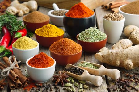 Various aromatic colorful spices and herbs. Ingredients for cooking. Ayurveda treatments.の写真素材