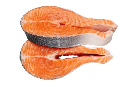 Fresh raw salmon fish steaks isolated on white.の写真素材