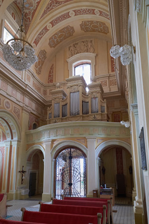 Luchai, Belarus - August 10, 2021:   Musical organ and interior of the ancient Church of St. Judas Thaddeus in Luchai village, Vitebsk region, Postavy district, Belarus.のeditorial素材