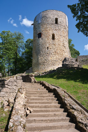 Latvian tourist landmark attraction -  tower and ruins of the Cesis medieval Livonian castle in Cesis town, Latvia.のeditorial素材