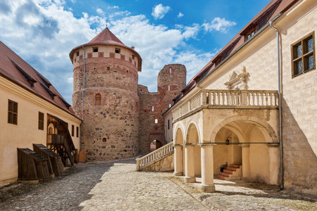 Latvian tourist landmark attraction. Medieval Bauska Castle courtyard. Ruins of medieval castle and the remains of a later palace. Bauska, Latvia.のeditorial素材