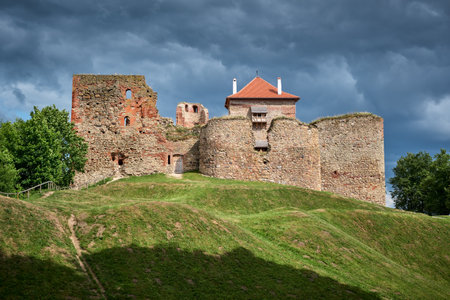 Latvian tourist landmark attraction - ruins of medieval Bauska castle and the remains of a later palace. Bauska city, Latvia.のeditorial素材