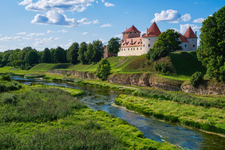 View of Latvian tourist landmark attraction -  ruins of old medieval Bauska castle and the remains of a later palace. Bauska city, Latvia.のeditorial素材