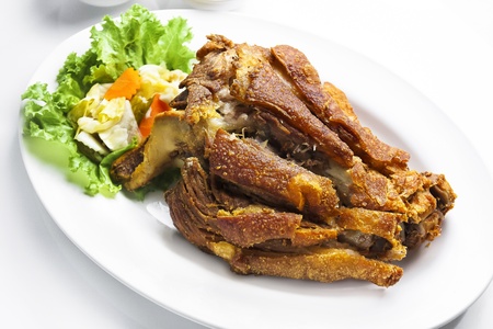 Fried pork hocks with preserve and sauce on white background の写真素材