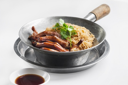 Braised Goose and Noodle in pot on white background  の写真素材