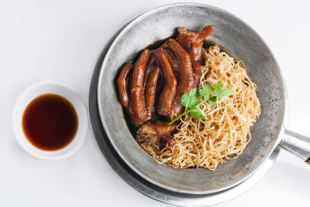 Braised Goose and Noodle in pot on white background  の写真素材
