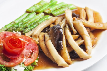 Stir-fried mixed vegetables and Razor shell on white background の写真素材