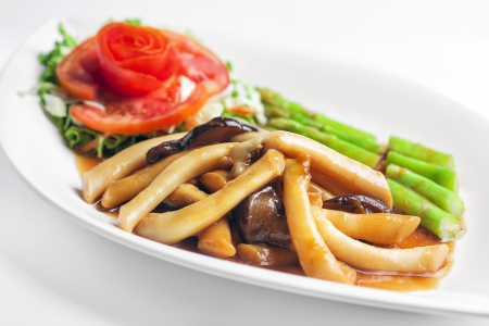 Stir-fried mixed vegetables and Razor shell on white background の写真素材