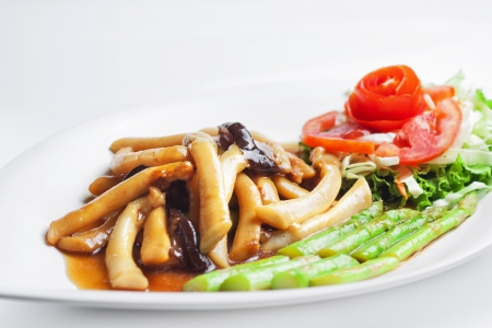 Stir-fried mixed vegetables and Razor shell on white background の写真素材