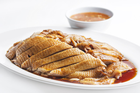 Duck five spices and sauce in dish on white background の写真素材