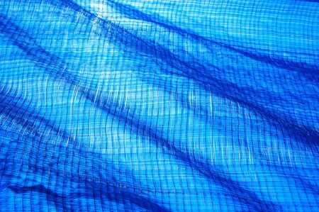 the blue lighting net use for cover the construction area to protect dusk 