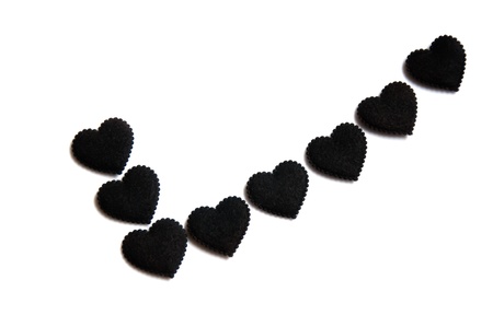 check mark symbol made from small black hearts の写真素材