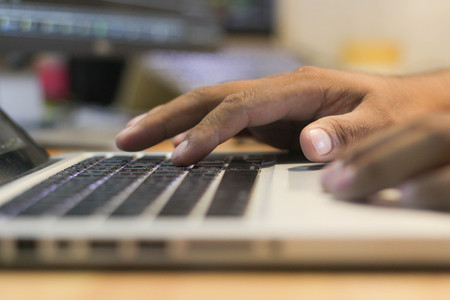 business man and closeup finger and keyboard use computer for working , selective focus.