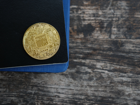 coin on wooden background and copy space, cryptocurrency money exchange investment concept.