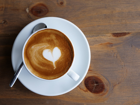hot lattee art top view , heart and copyspace, beverage concept.の写真素材