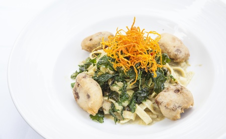 pasta with blue cheese sauce and spinachの写真素材