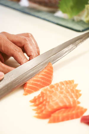 salmon fillet with knifeの写真素材