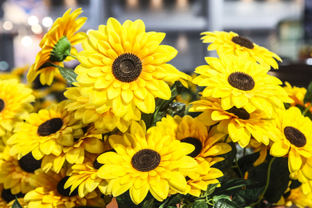 Plastic decorative sunflower sales during festive season.の写真素材
